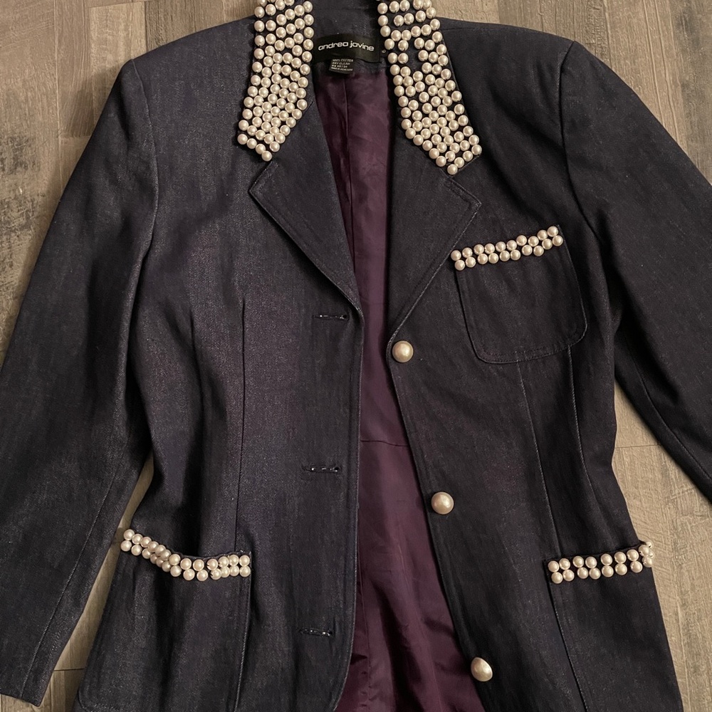 Jean jacket. Missing pearls. You can glue missing pearls or add nice brooch.